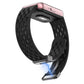 Black perforated silicone watch band with magnetic clasp shown attached to a watch