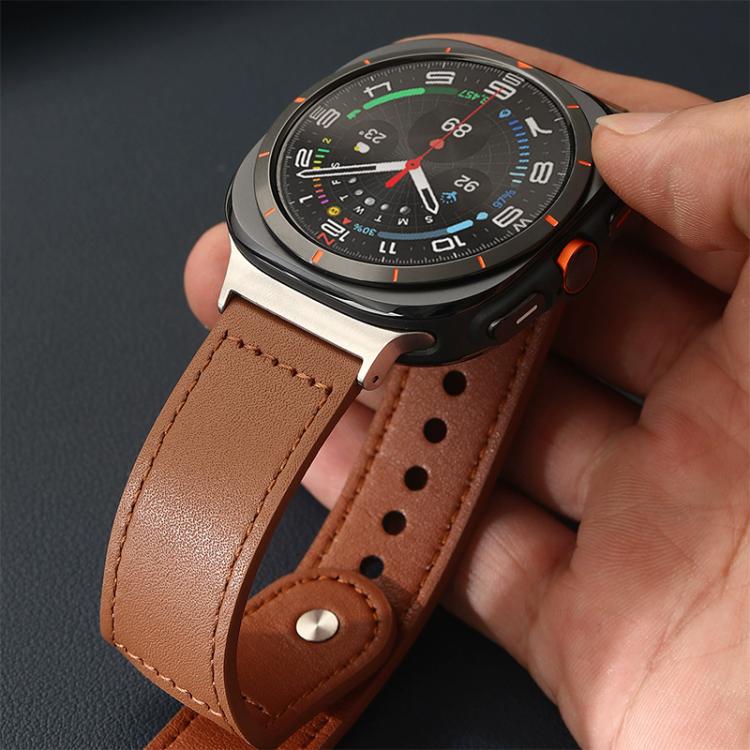 Tan leather watch band with stitched edges, adjustment holes, and a metal rivet buckle