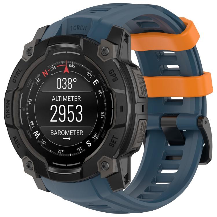 Blue silicone watch band with orange loops fitted to a rugged smartwatch