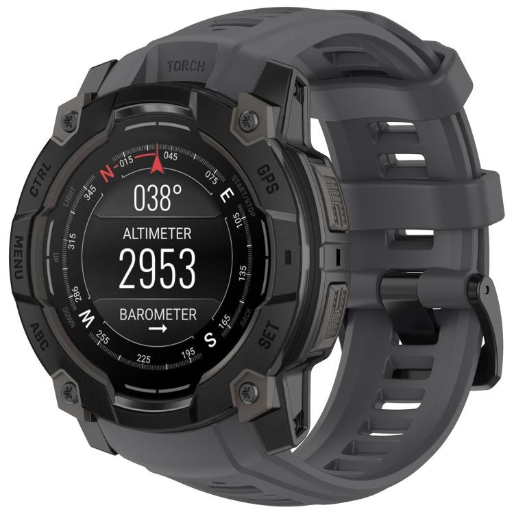 Quick-release silicone watch band in graphite gray on a rugged Garmin watch