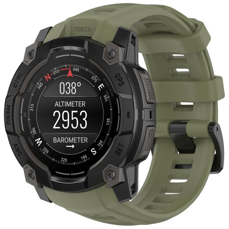 Quick-release silicone watch band in olive green, fitted to a rugged smartwatch
