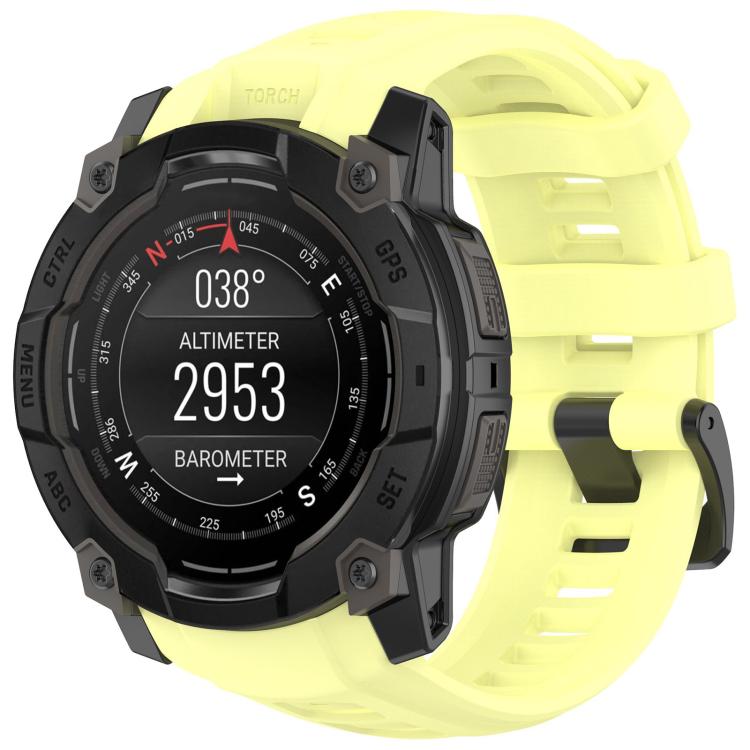 Quick-release silicone watch band in pale yellow, fitted to a rugged smartwatch