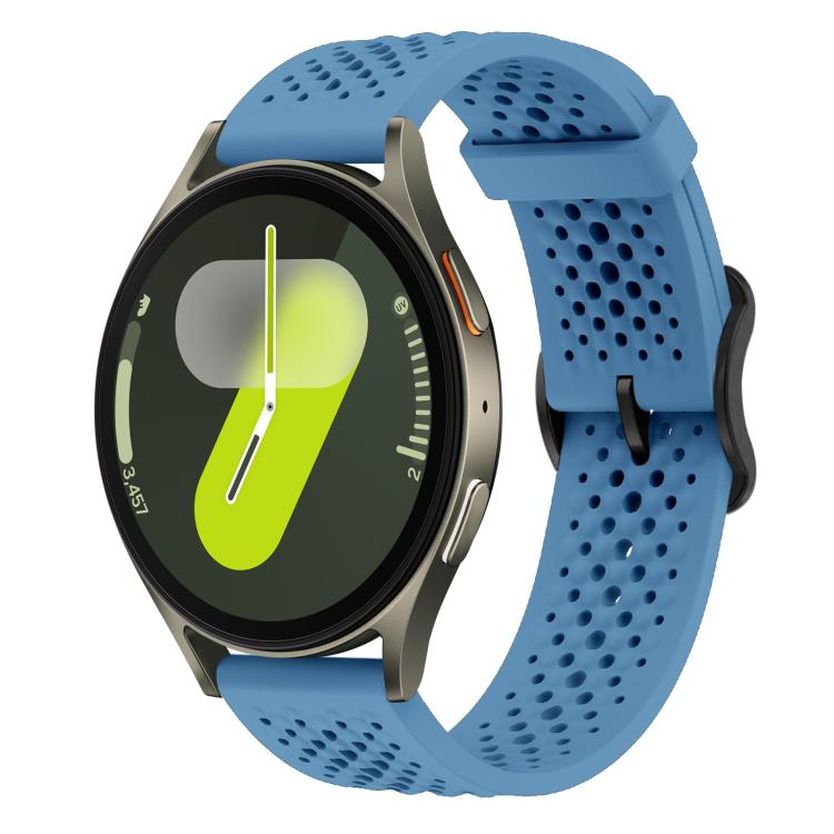 Blue perforated silicone watch band with a round smartwatch