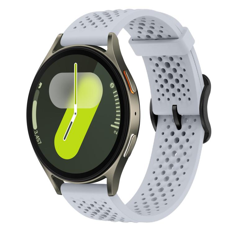 Light gray perforated silicone watch band with a round smartwatch