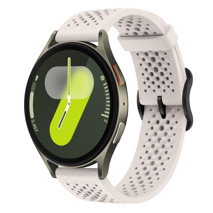 White perforated silicone watch band with a round smartwatch