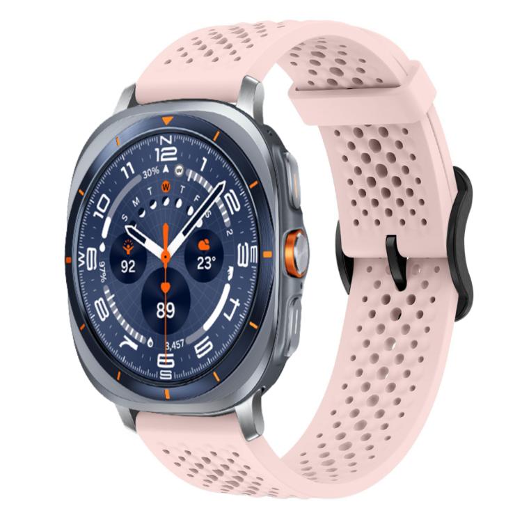 Pink perforated silicone watch band with buckle, shown attached to a smartwatch