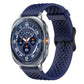 Midnight blue perforated silicone watch band with buckle, shown attached to a smartwatch