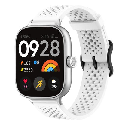 White perforated silicone watch band with black buckle attached to a smartwatch