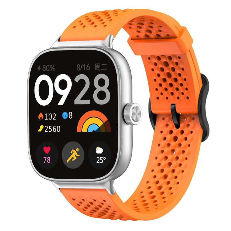 Orange perforated silicone watch band with silver smartwatch