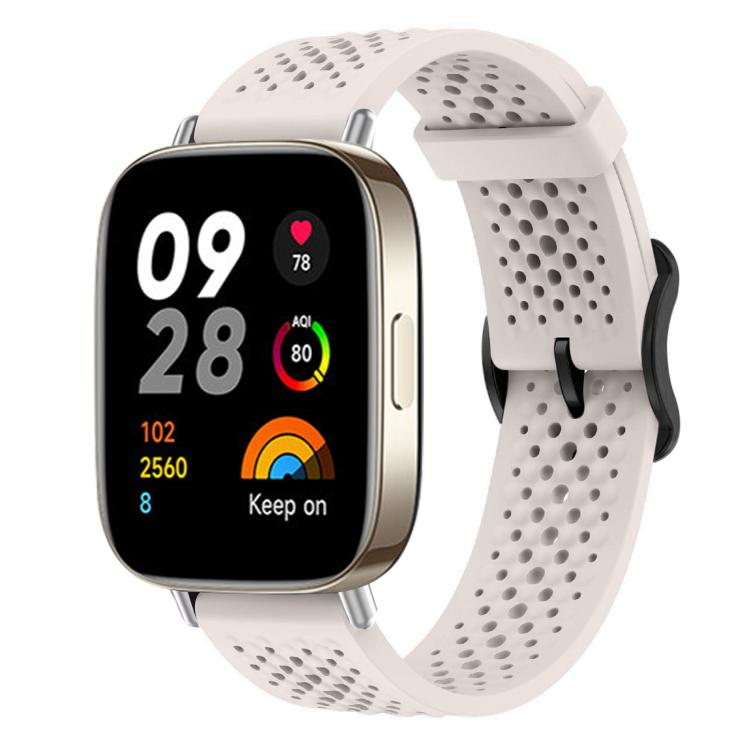 White perforated silicone watch band shown on a smartwatch