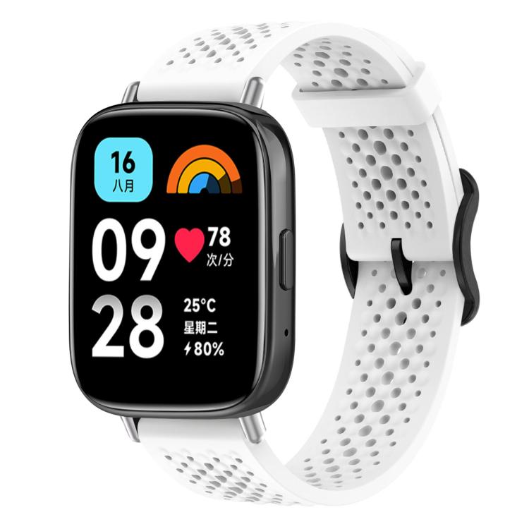 White perforated silicone watch band on a black smartwatch