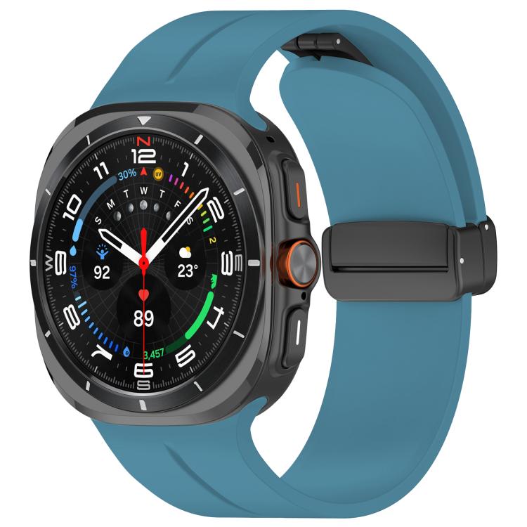 Rock blue silicone watch band with black folding buckle fitted to a smartwatch