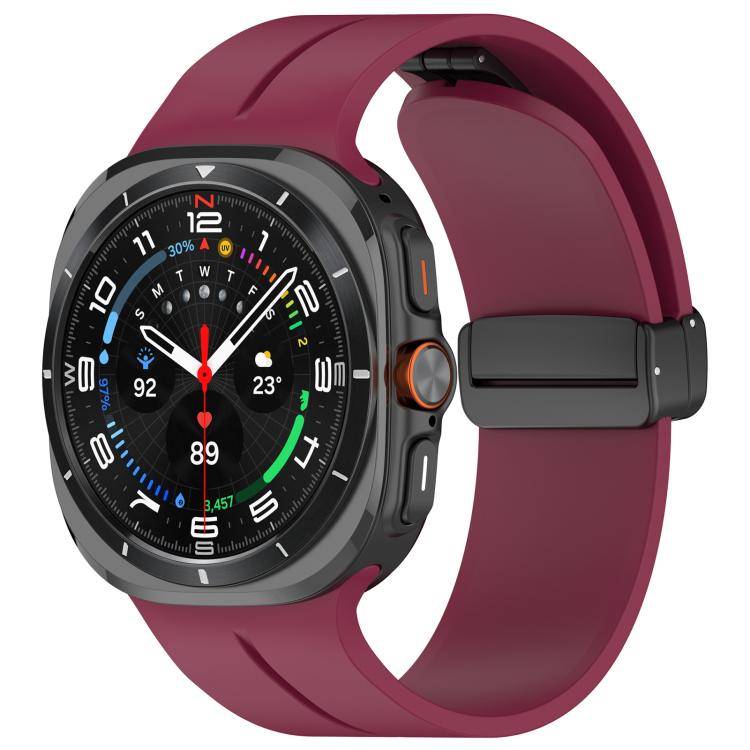 Wine red silicone watch band with black folding buckle fitted to a smartwatch