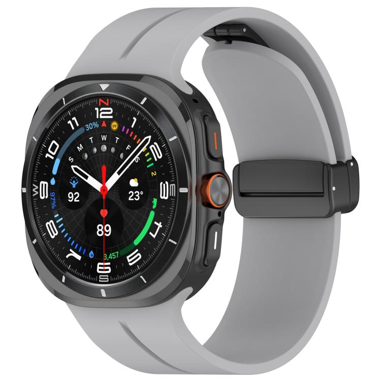 Light gray silicone watch band with black folding buckle fitted to a smartwatch