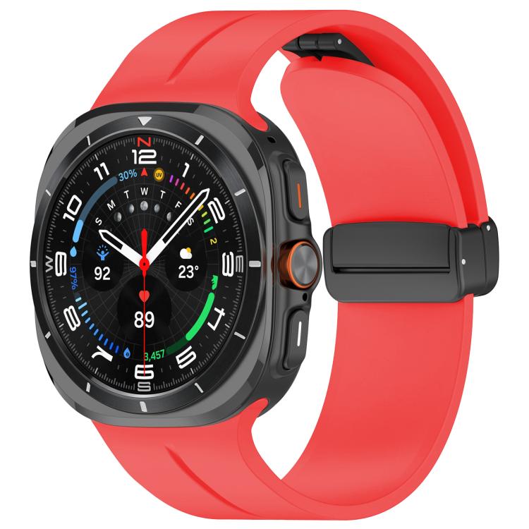Galaxy watch with a red silicone band and black folding buckle