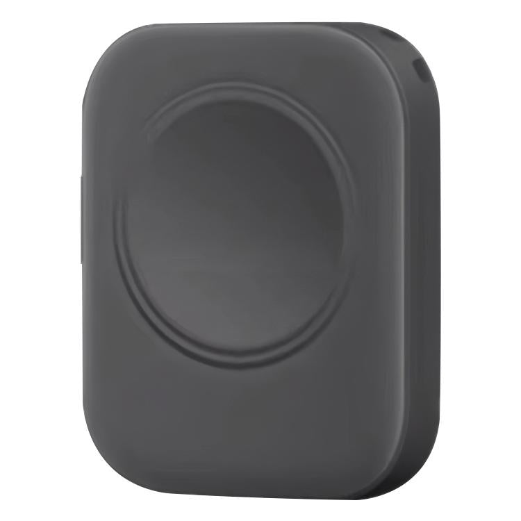 Black magnetic wireless watch charger with a raised circular charging pad.