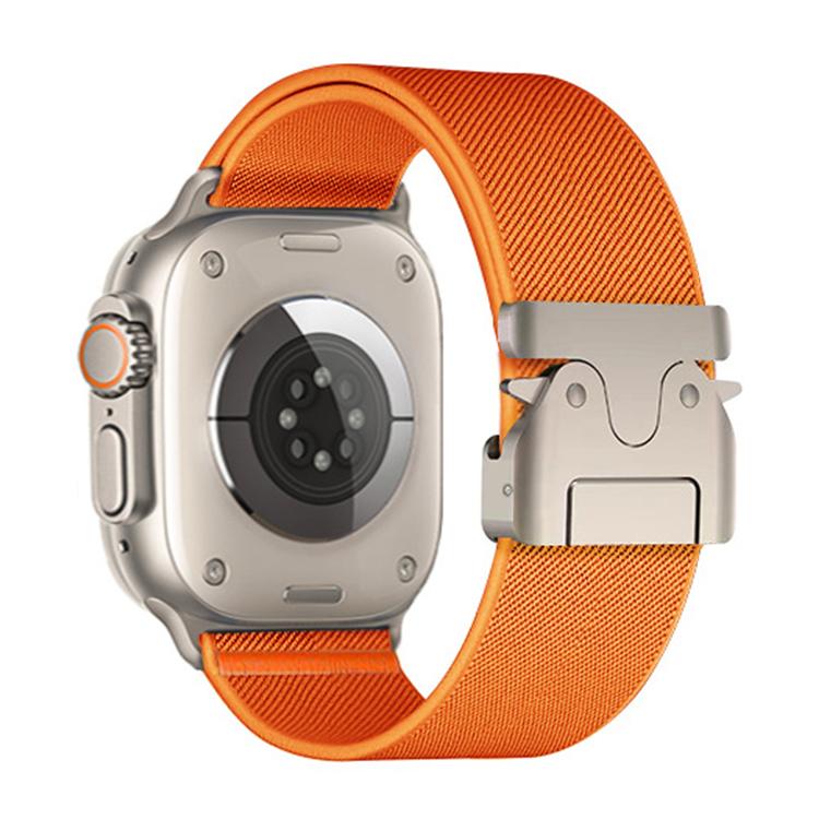 Orange xDfind nylon watch band and buckle shown from the back of an Apple Watch
