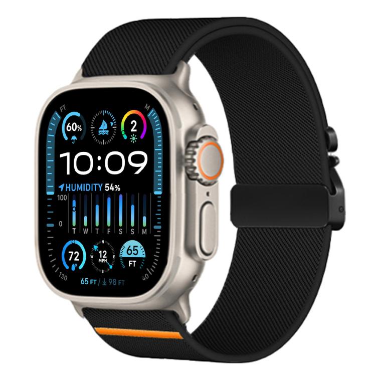 xDfind black nylon watch band with parachute buckle and orange accent, shown on Apple Watch