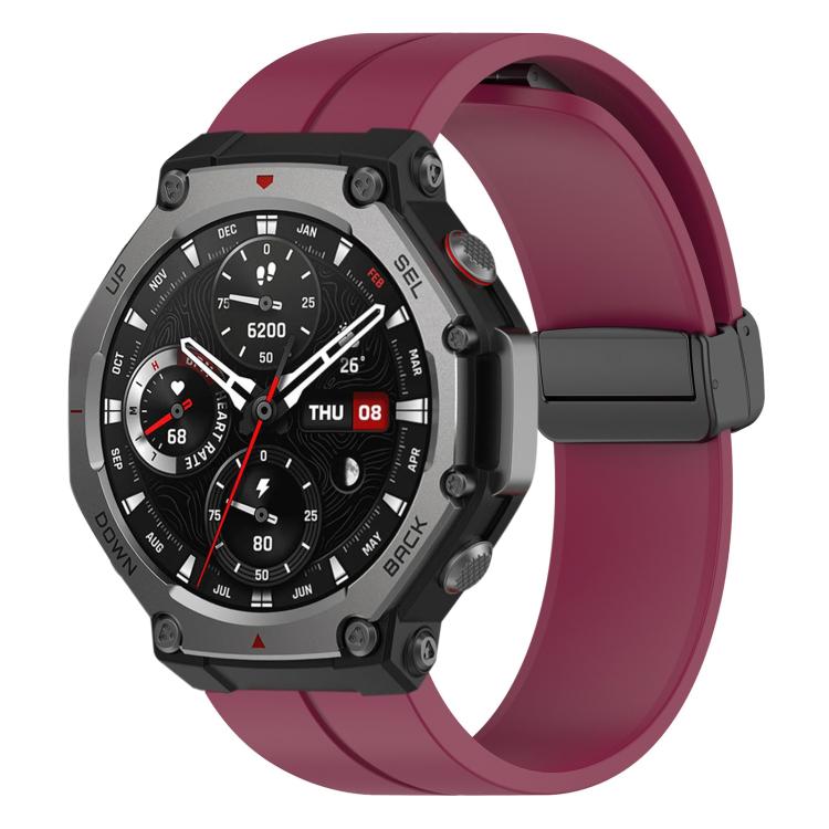 Wine red silicone watch band with black folding buckle on an Amazfit T-Rex 3 watch