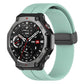 Emerald green silicone watch band with black folding buckle on an Amazfit T-Rex 3 watch