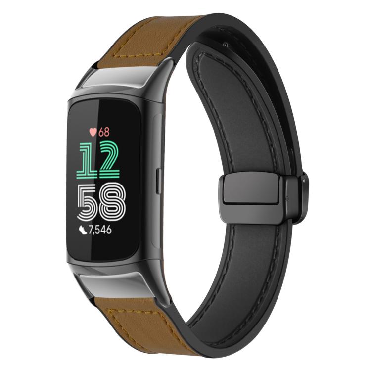 Brown silicone watch band with stitched pattern and magnetic buckle on a fitness tracker