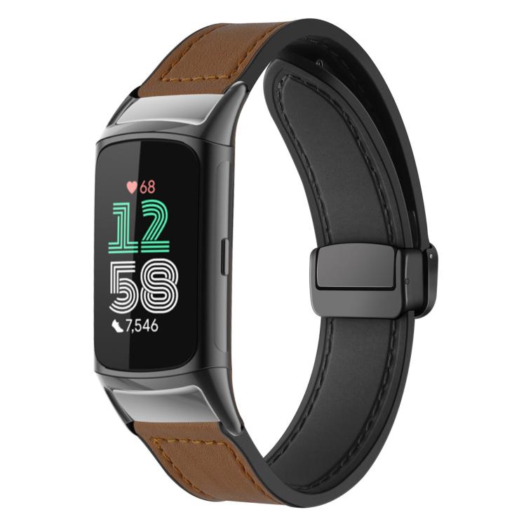 Light brown silicone watch band with stitched pattern and magnetic buckle on a fitness tracker