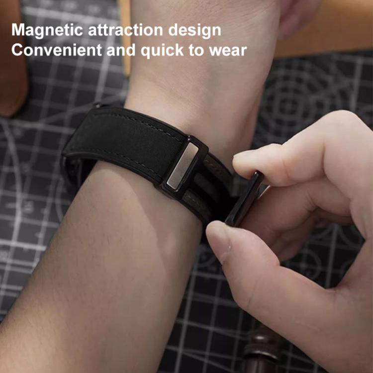 xDfind black silicone watch band being fastened with its magnetic buckle