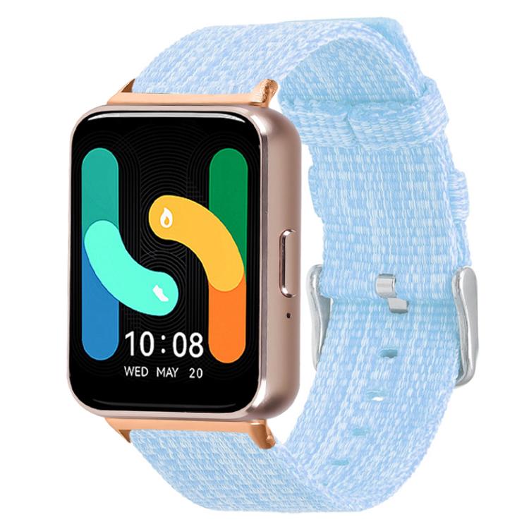 Light blue woven nylon watch band with metal buckle, shown on a smartwatch