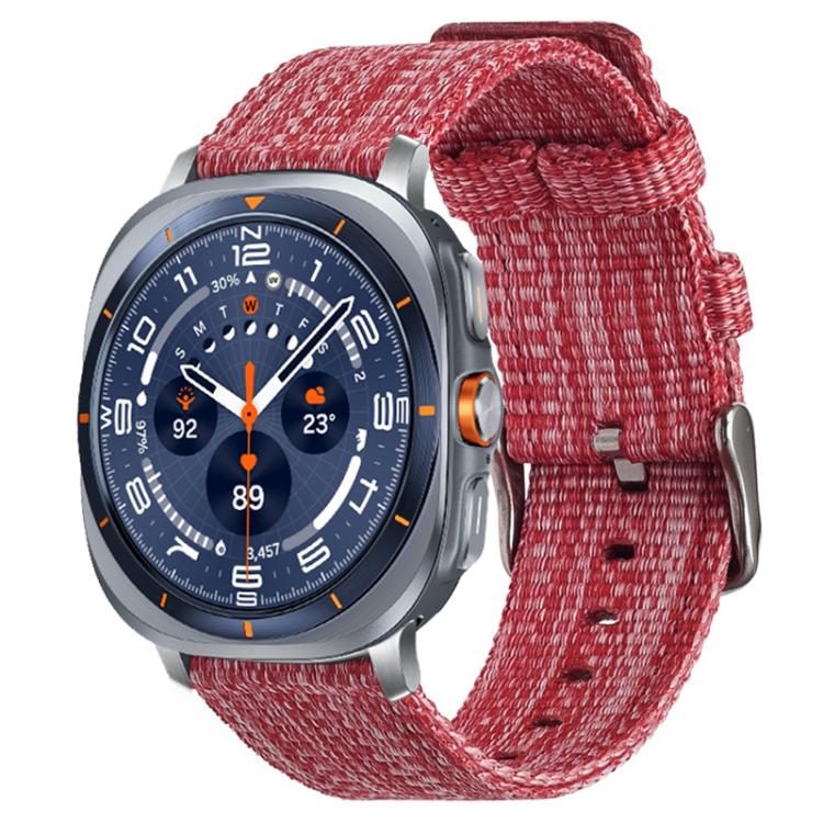 Red nylon canvas watch band fitted to a silver smartwatch