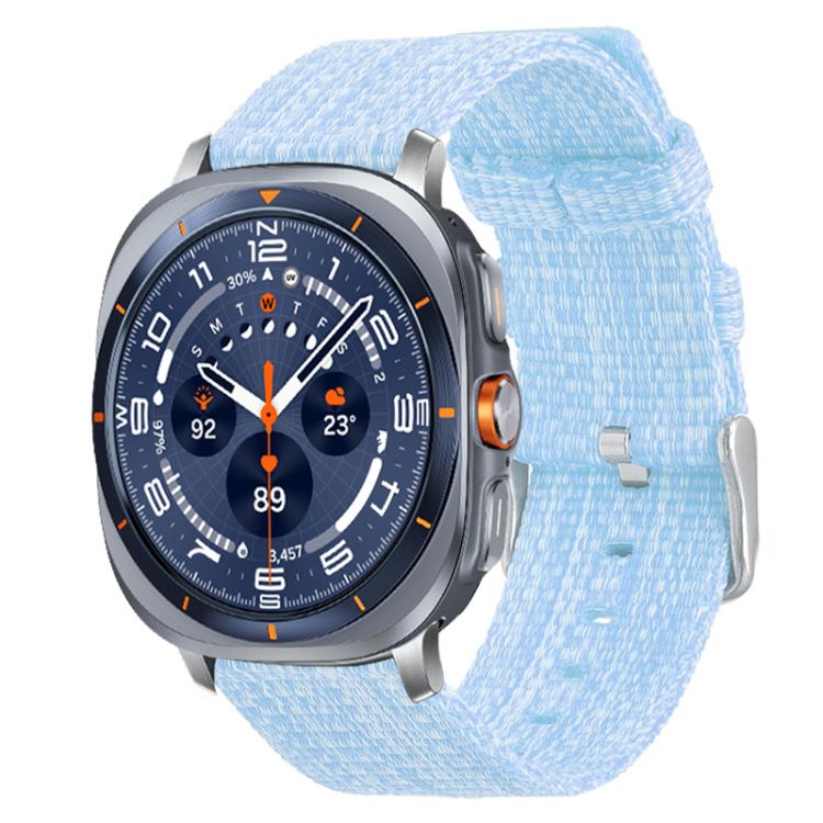 Sky blue nylon canvas watch band fitted to a silver smartwatch