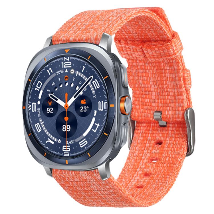 Orange nylon canvas watch band fitted to a silver smartwatch