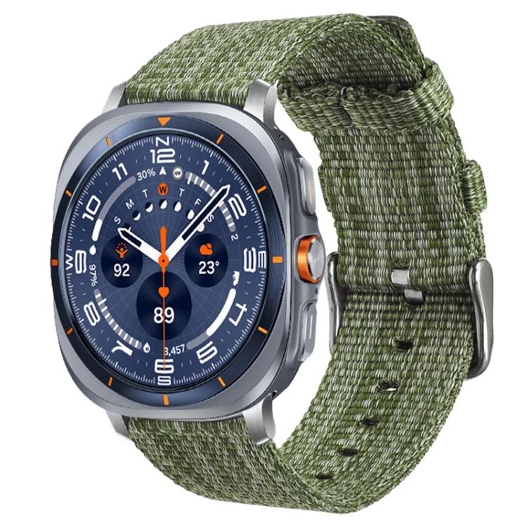 Army green nylon canvas watch band fitted to a silver smartwatch