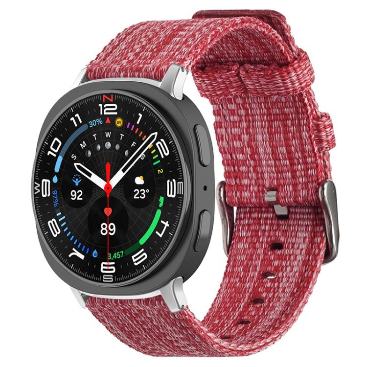 Red woven nylon canvas watch band with a metal buckle on a smartwatch