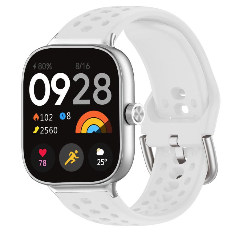 White perforated silicone sport watch band with silver buckle on a silver smartwatch