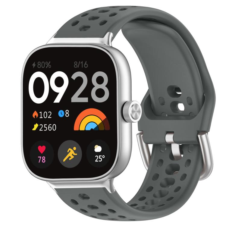 Dark gray perforated silicone sport watch band with silver buckle, shown on a smartwatch