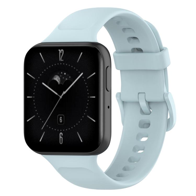 Pale blue silicone watch band fitted to a rectangular smartwatch, with adjustable buckle and holes