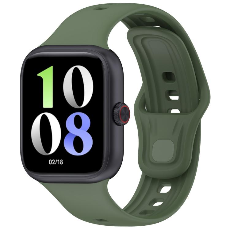 Dark green silicone watch band fitted to a black smartwatch, with adjustable holes and pin closure.