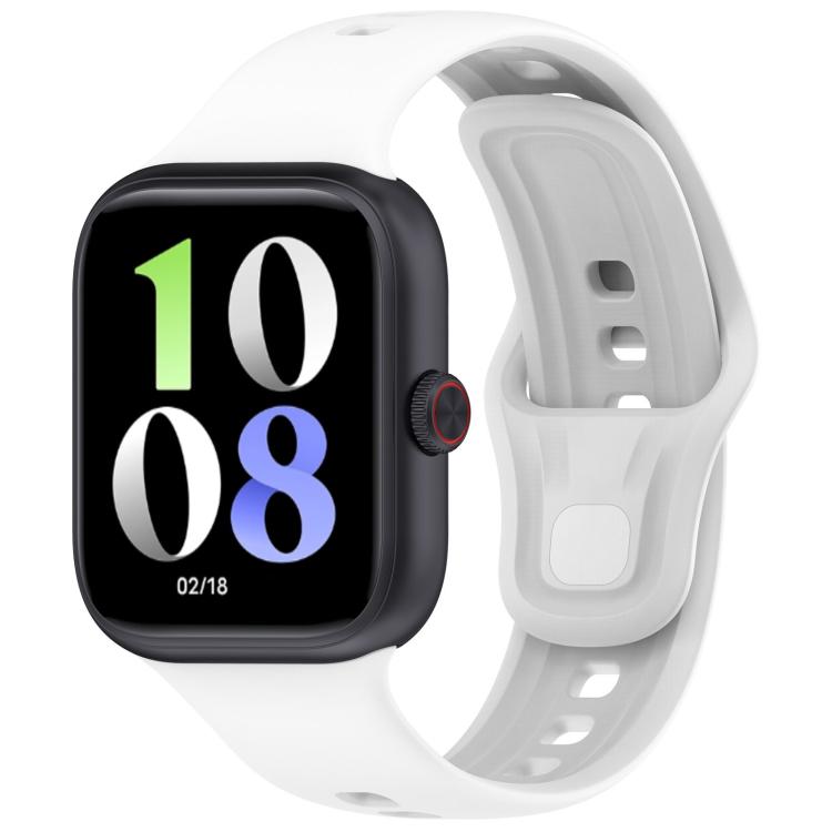 White silicone watch band fitted to a black smartwatch, with adjustable holes and pin closure.