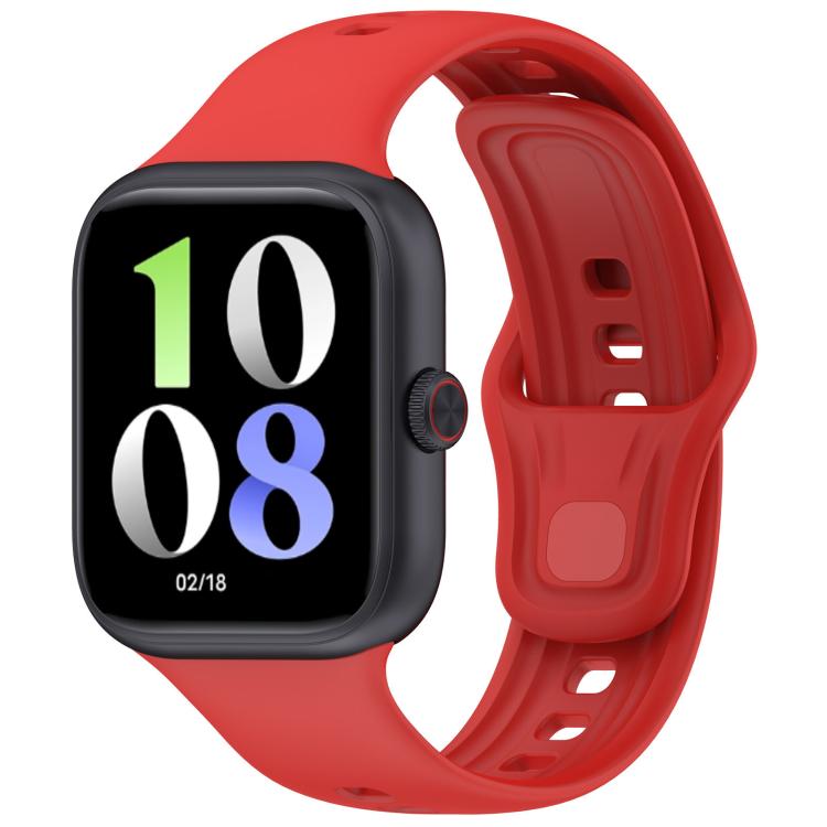 Red silicone watch band fitted to a black smartwatch, with adjustable holes and pin closure.