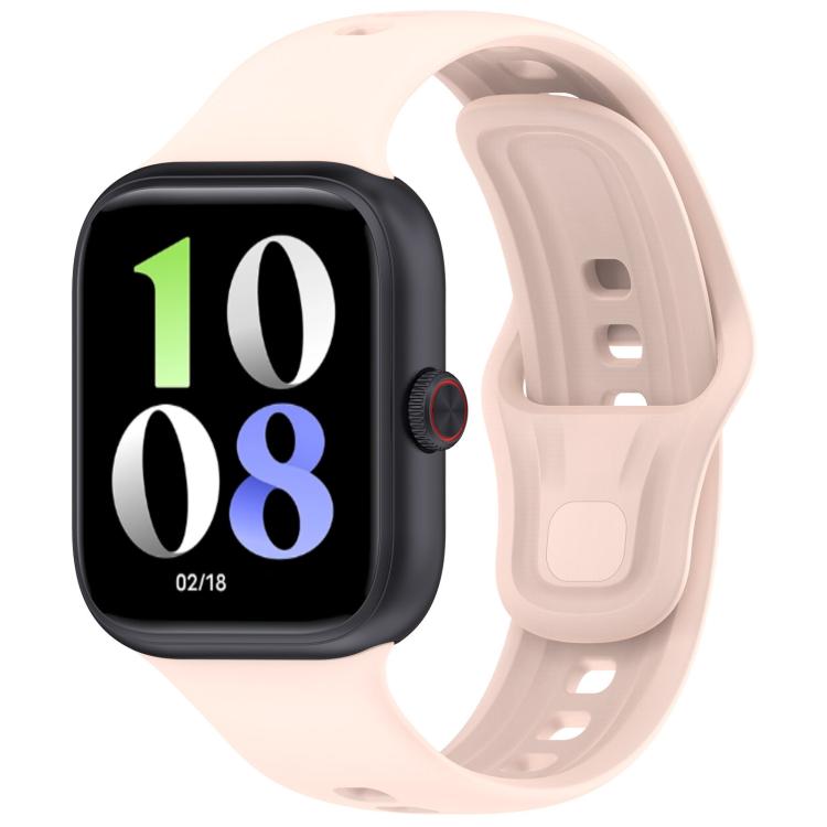Light pink silicone watch band fitted to a black smartwatch, with adjustable holes and pin closure.