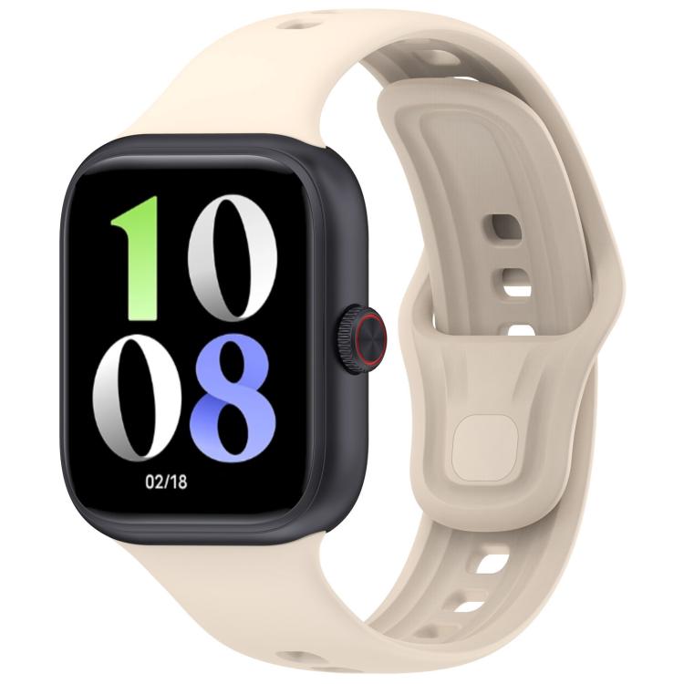 Silicone watch band in ivory fitted to a black smartwatch, with adjustable holes and pin closure.