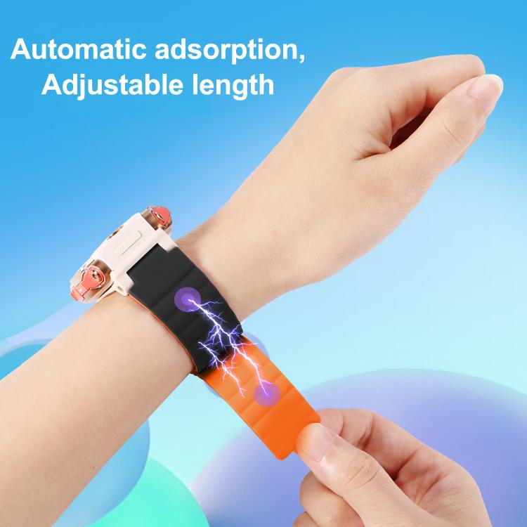 Black and orange silicone magnetic watch band shown being adjusted on a wrist.