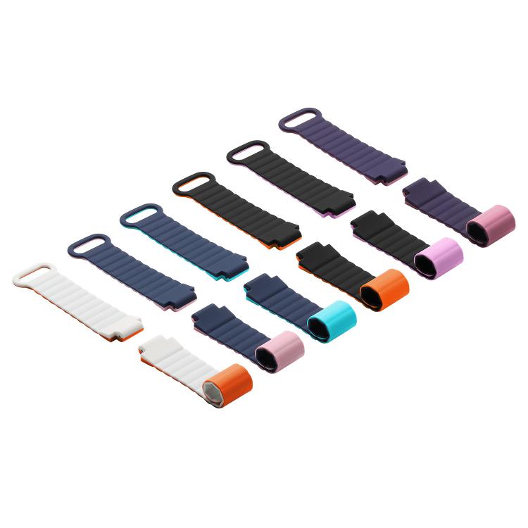 Assorted two-tone silicone magnetic watch bands in several color combinations.