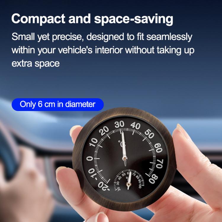 Small round car thermometer and hygrometer gauge with black face and bronze bezel.