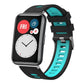Black and cyan silicone watch band with silver buckle, shown on a smartwatch