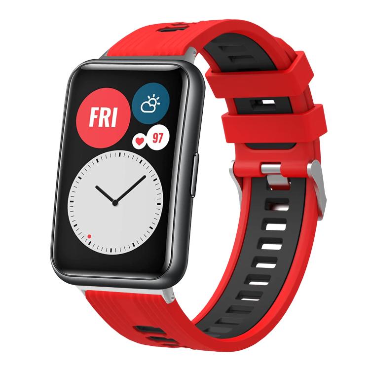 Red and black silicone watch band with silver buckle on a smartwatch