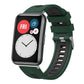 Dark green and black silicone watch band with silver buckle on a smartwatch