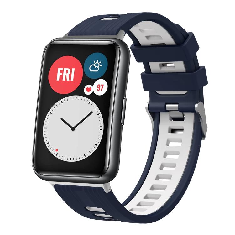 Navy and white silicone watch band with silver buckle on a smartwatch