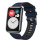 Navy and black silicone watch band with silver buckle on a smartwatch