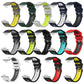 Assorted two-tone silicone watch bands with silver buckles, shown without watches